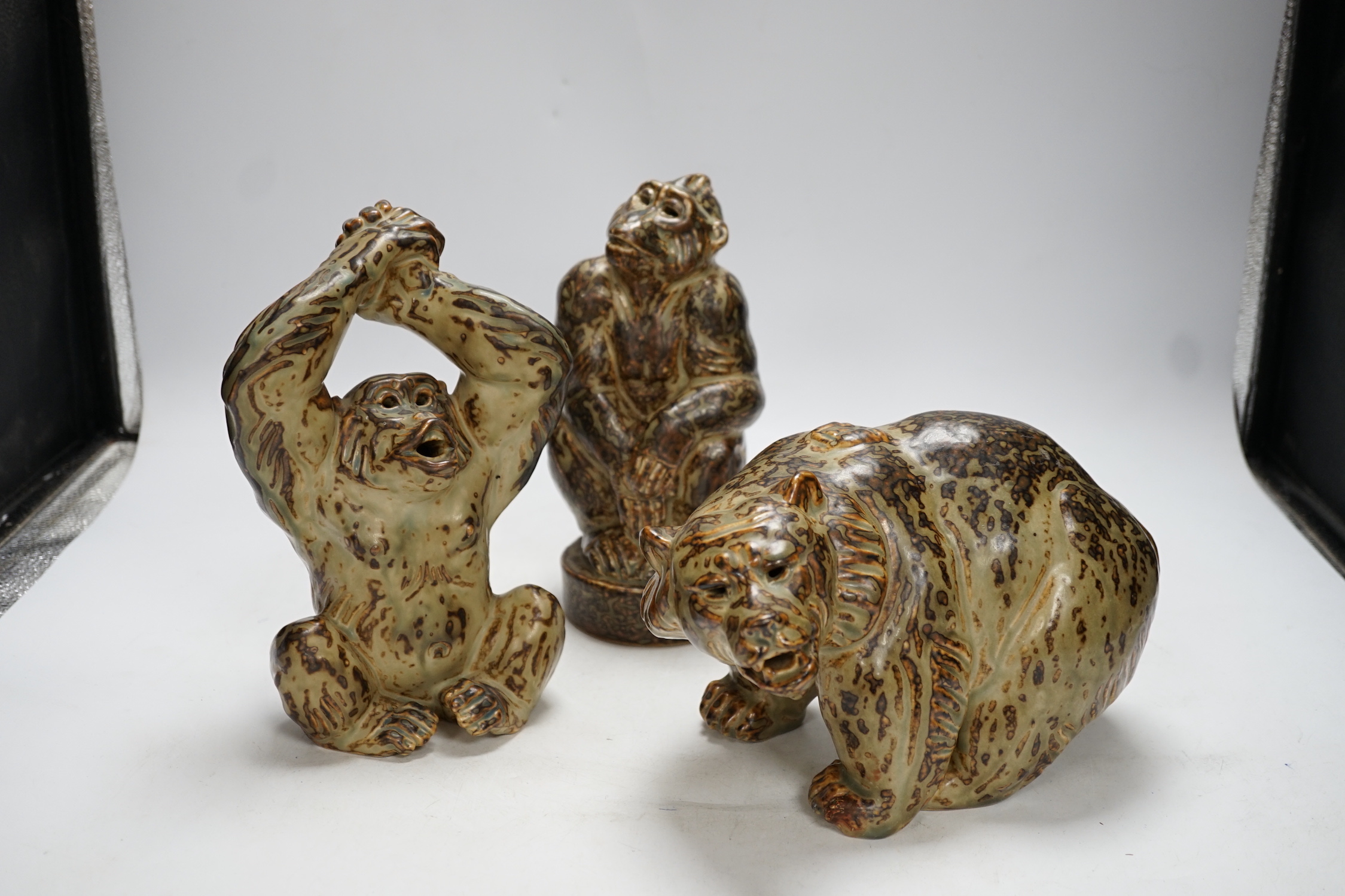 Three Royal Copenhagen, stoneware animals by Knud Kyhn; a monkey (21633), an ape (20227) and a bear (20140), tallest 21.5 cm